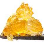 Assorted cannabis extracts including shatter, oils, and vape cartridges