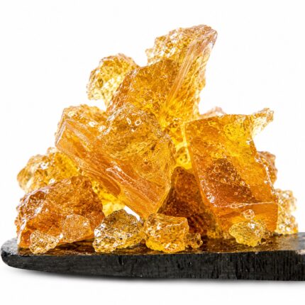 Assorted cannabis extracts including shatter, oils, and vape cartridges