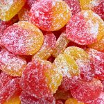 Elevate Sour Peach Slices – Tangy and sweet THC-infused peach gummies